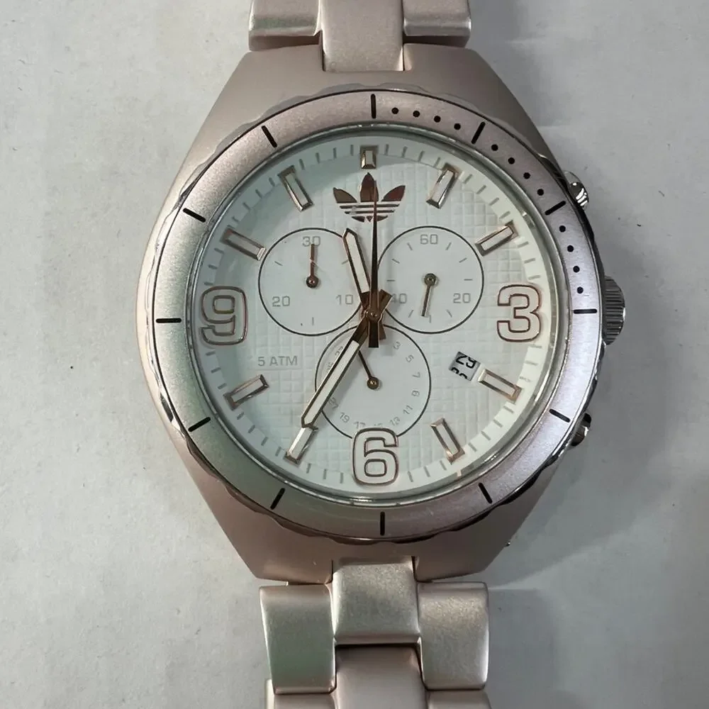 Adidas Metallic rose gold tone Watch with White and gold dial